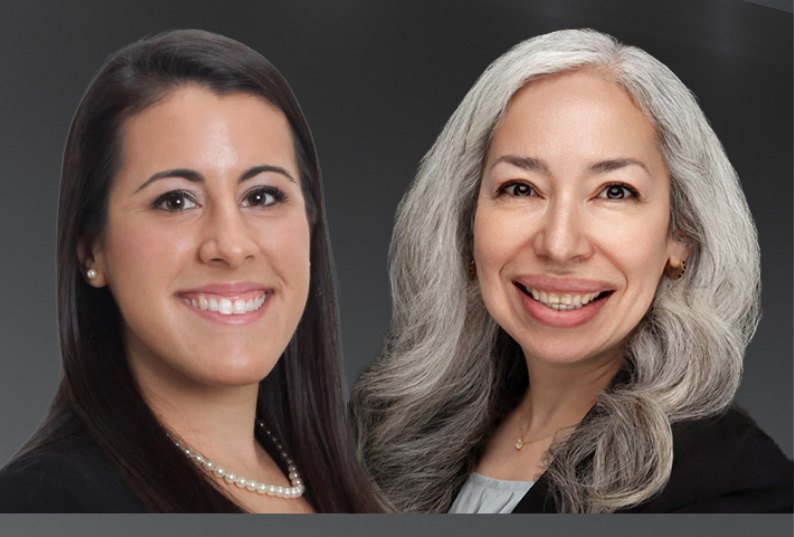 smiling dentists Courtney Botica and Maribel Reyes de Lobos